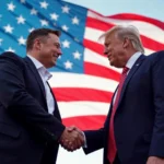 A photo of Elon Musk and Donald Trump shaking hands